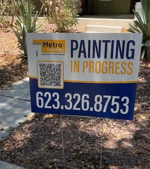 Metro Painting yard sign reading Painting in Progress, 623.326.8753